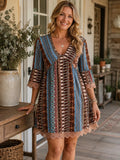 Vintage boho-tunika med V-ringni