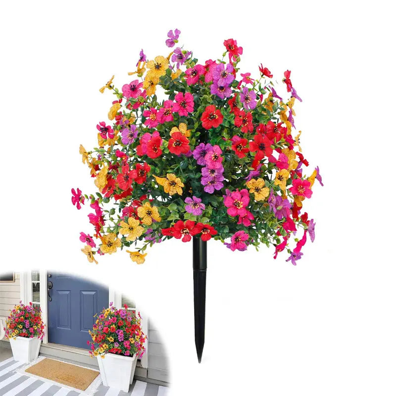 Blomsterdekoration med konstgjord eukalyptus och violer i jord